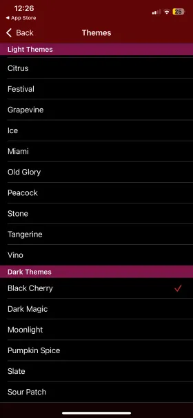 OurGroceries' Themes screen listing light themes including Citrus, Festival, Grapevine, Ice, Miami, Old Glory, Peacock, Stone, Tangerine and Vino, then dark themes including Black Cherry, which is ticked as selected, Dark Magic, Moonlight, Pumpkin Spice, Slate and Sour Patch
